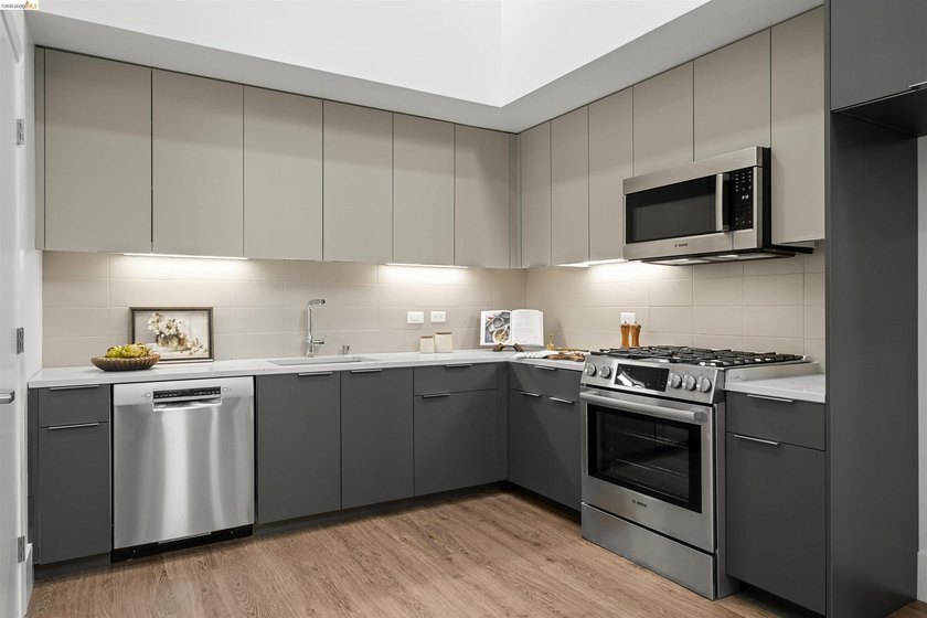 LARGE ONE BEDROOM PLUS AND ONE AND A HALF BATHROOM LOFT STYLE! - photo 12