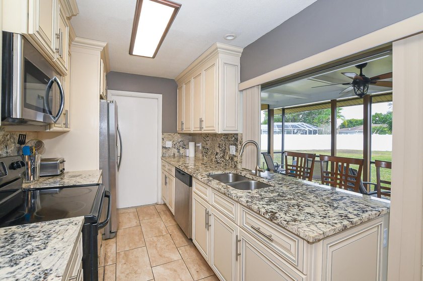 HOME SITS ON 1/3 OF AN ACRE BEAUTIFUL CORNER LOT! UPDATED - photo 3