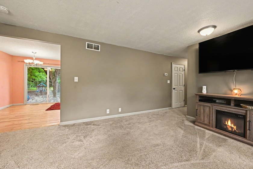 Nestled on 2 beautiful acres, this spacious ranch offers the - photo 5