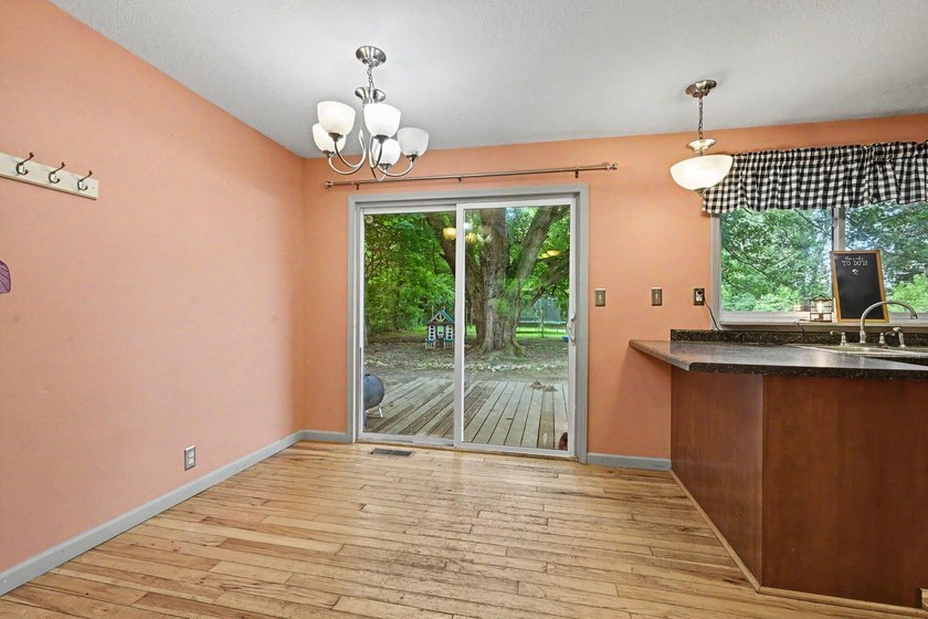 Nestled on 2 beautiful acres, this spacious ranch offers the - photo 6