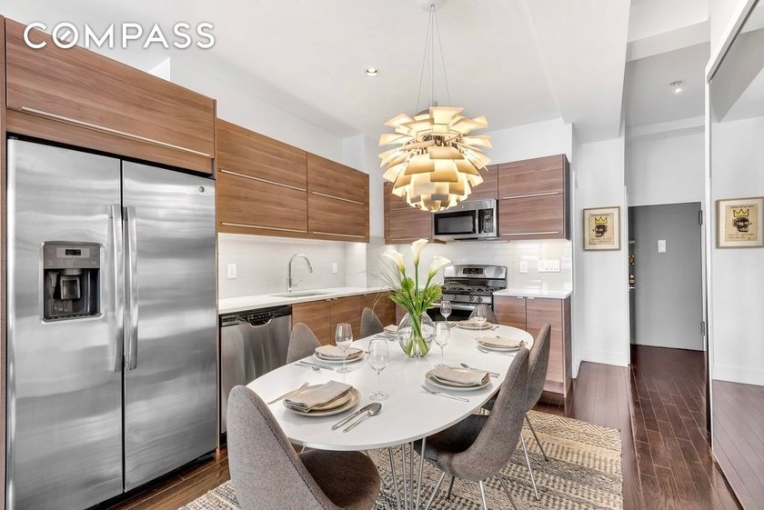 Apartment 17D at 315 7th Avenue offers a rare blend of volume - photo 3