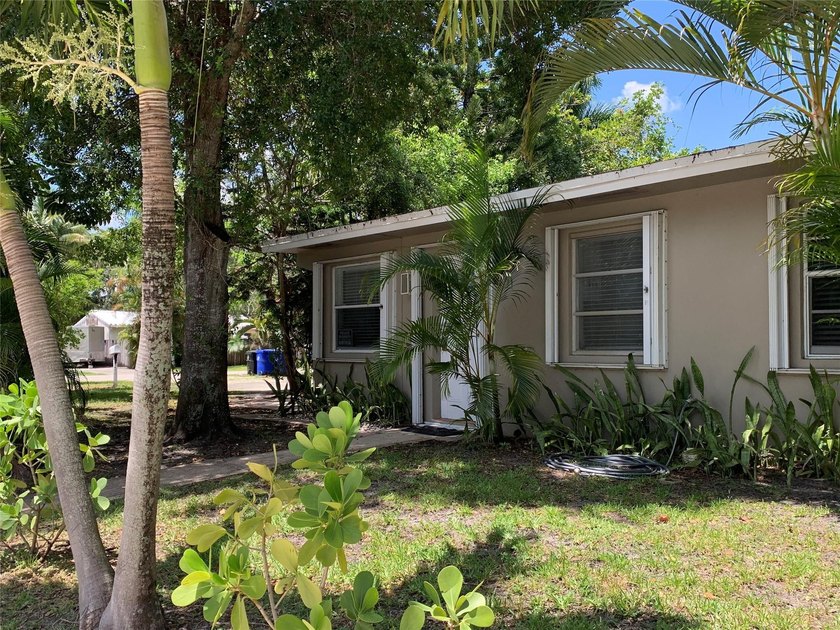 Exceptional corner-lot duplex in sought-after Tarpon River - photo 2