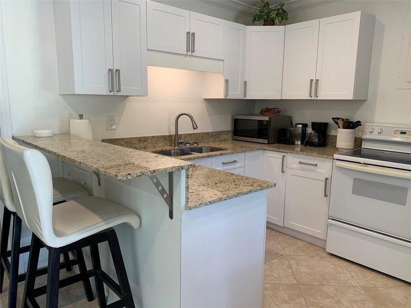 Exceptional corner-lot duplex in sought-after Tarpon River - photo 6