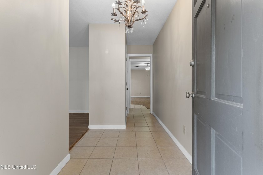 This well-maintained 4-bedroom, 2-bath brick home is situated on - photo 7