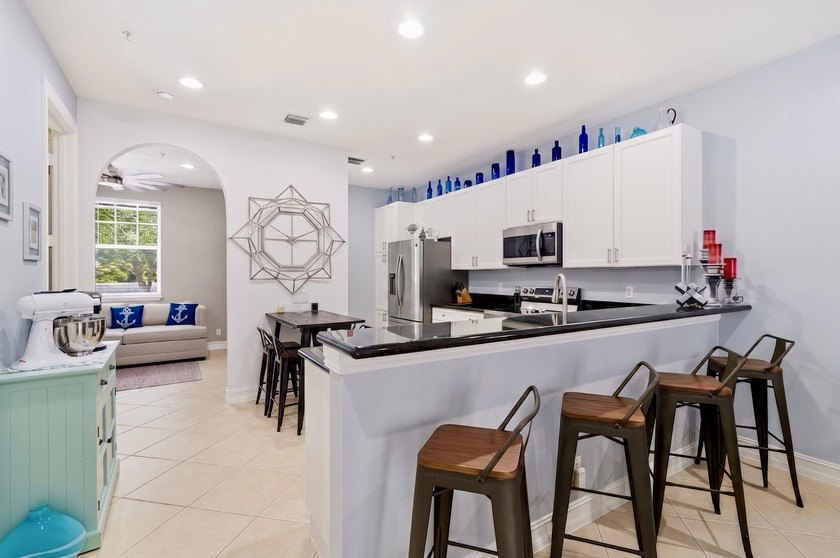 Rare 4-bedroom, 4-bath tri-level townhome in Belle Isle, one of - photo 3