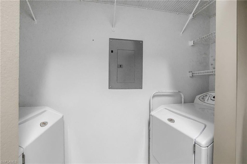 Centrally located beautifully renovated 2/2 end unit with high - photo 11