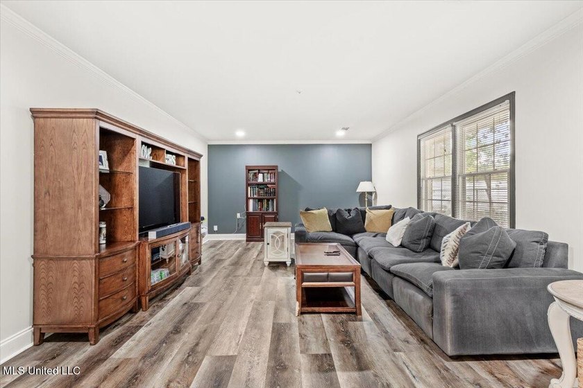 Welcome to this spacious and beautifully appointed 4-bedroom - photo 12