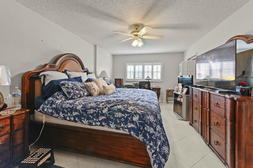 Welcome to this charming 2-bedroom, 2-bathroom condominium - photo 12