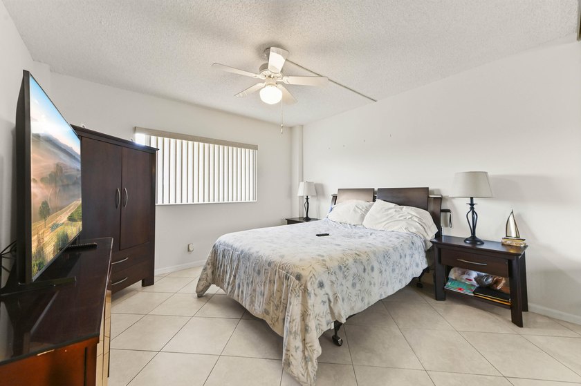 Welcome to this charming 2-bedroom, 2-bathroom condominium - photo 13