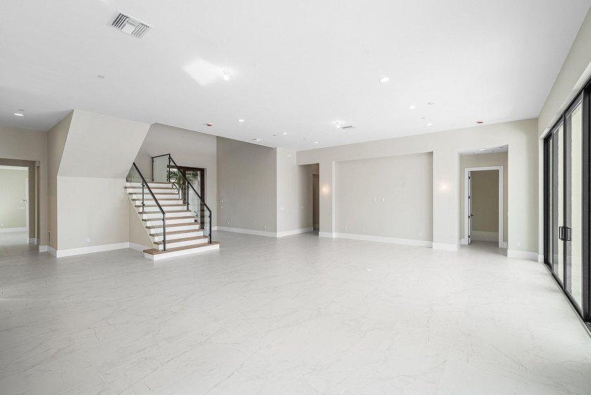NO EXPENSE OR DETAIL SPARED IN OUR LARGEST ESTATE HOME IN CORAL - photo 13