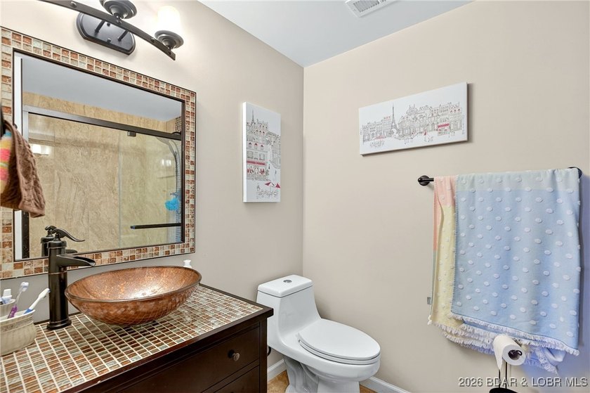 Lake life doesn't get easier-or cozier-than this. This two-story - photo 22