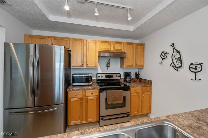 RIVERFRONT CONDO FOR SALE! Enjoy stunning views and a relaxing - photo 22