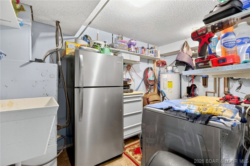Lake life doesn't get easier-or cozier-than this. This two-story - photo 31