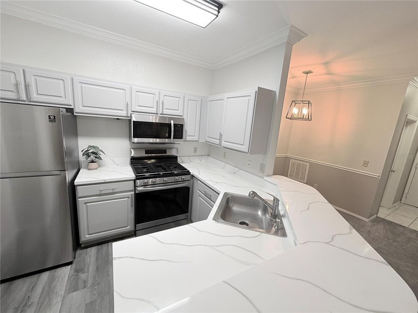 PENDING- Welcome to easy coastal living in The Grand Reserve, a - photo 5