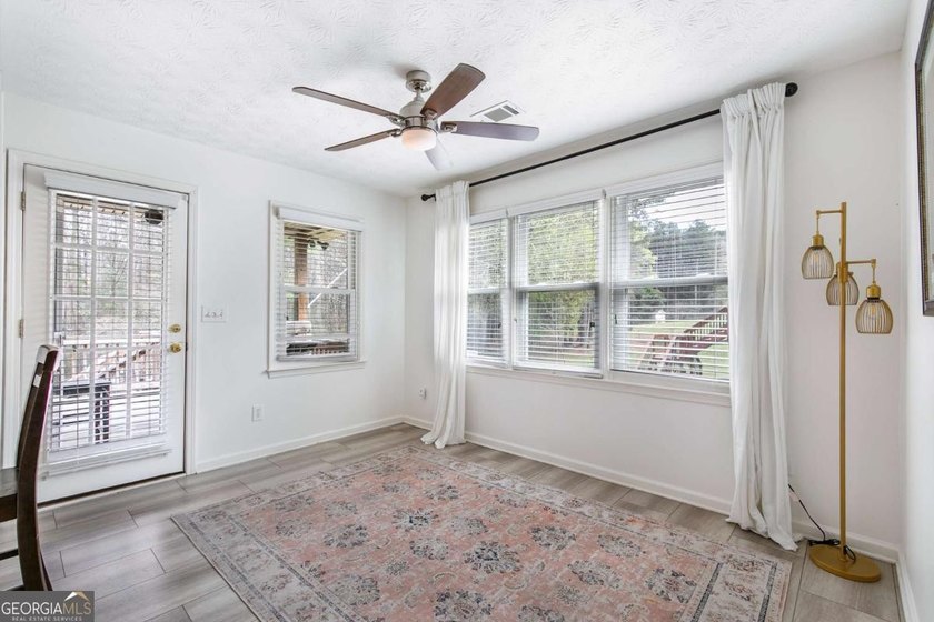 You will love this SPRAWLING RANCH WITH BONUS on a partially - photo 9
