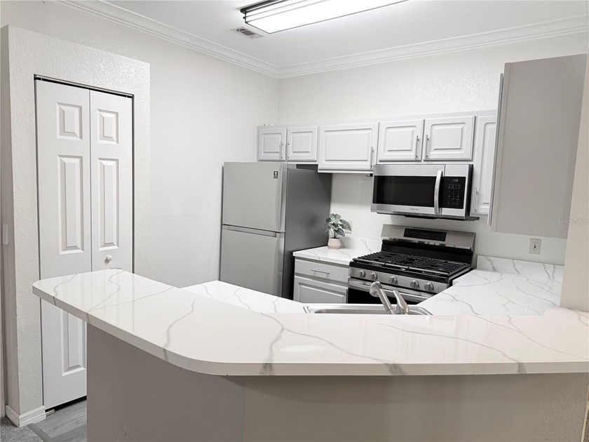 PENDING- Welcome to easy coastal living in The Grand Reserve, a - photo 10