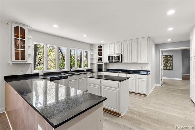 Situated on 1.13 acres with 150 feet of waterfront on the canal - photo 9