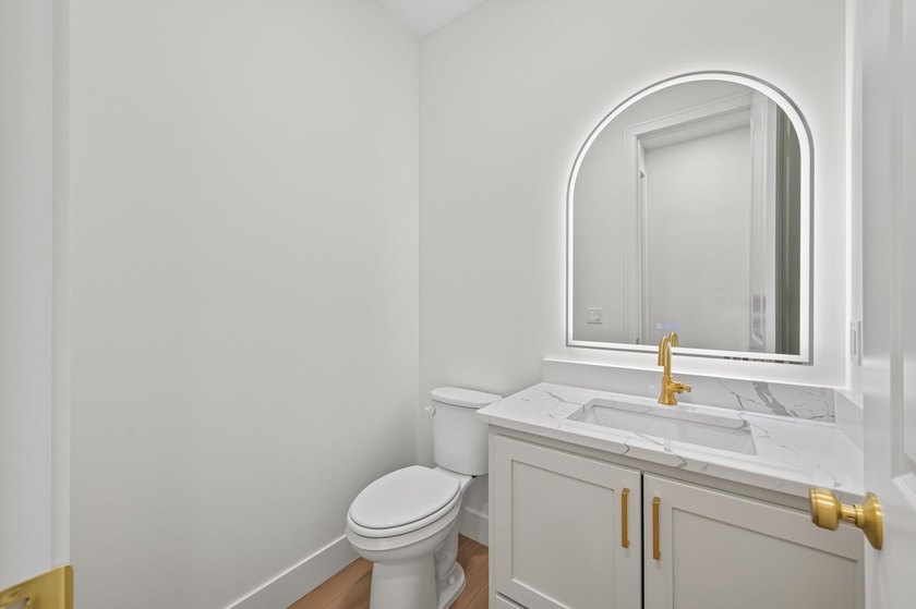 Experience luxury living in this custom-built two-story home by - photo 14
