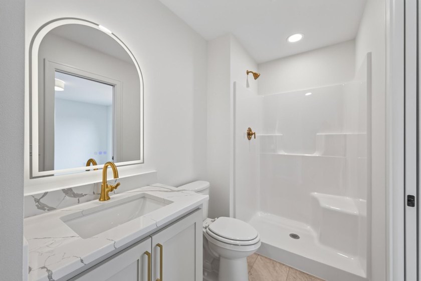 Experience luxury living in this custom-built two-story home by - photo 23