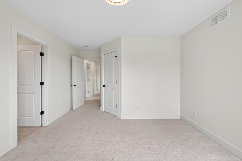 Experience luxury living in this custom-built two-story home by - photo 25