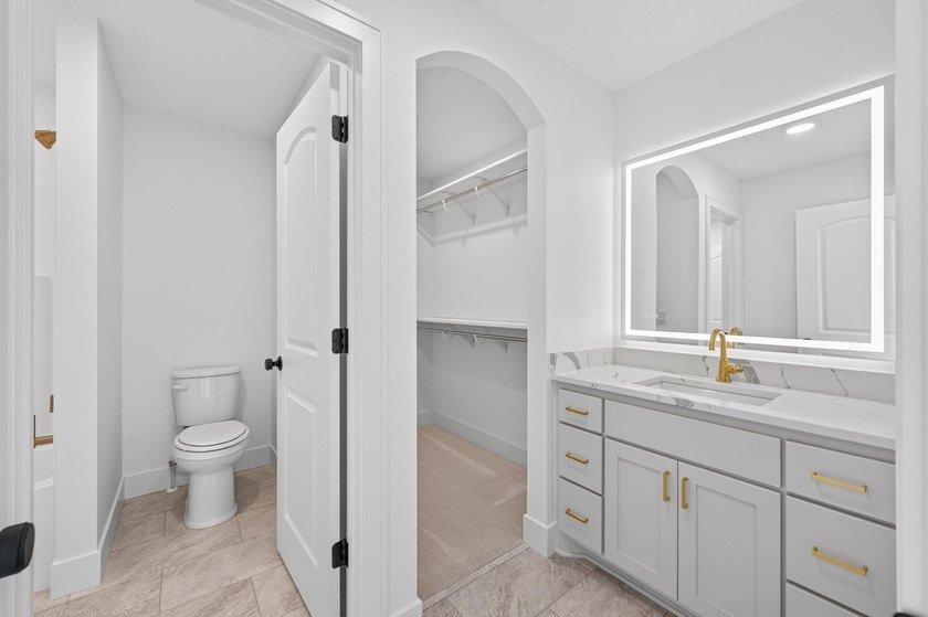 Experience luxury living in this custom-built two-story home by - photo 30