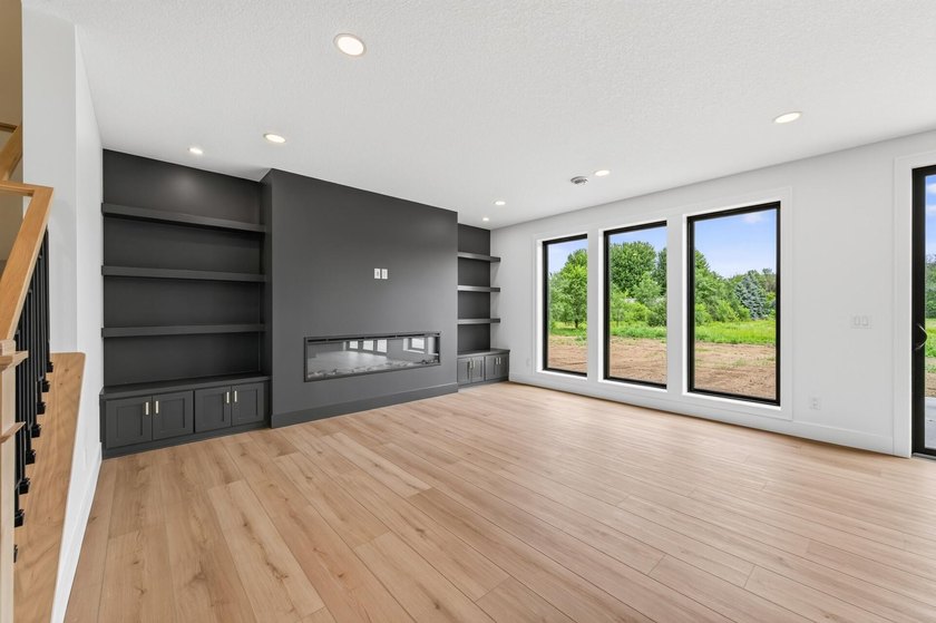 Experience luxury living in this custom-built two-story home by - photo 32