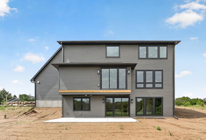 Experience luxury living in this custom-built two-story home by - photo 45