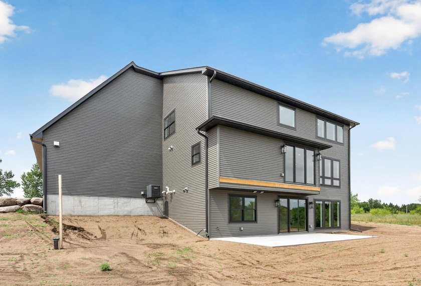 Experience luxury living in this custom-built two-story home by - photo 46