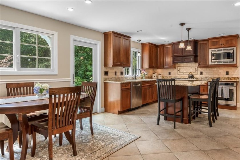 This 4-bedroom Colonial in *The Glen* offers the perfect balance - photo 18