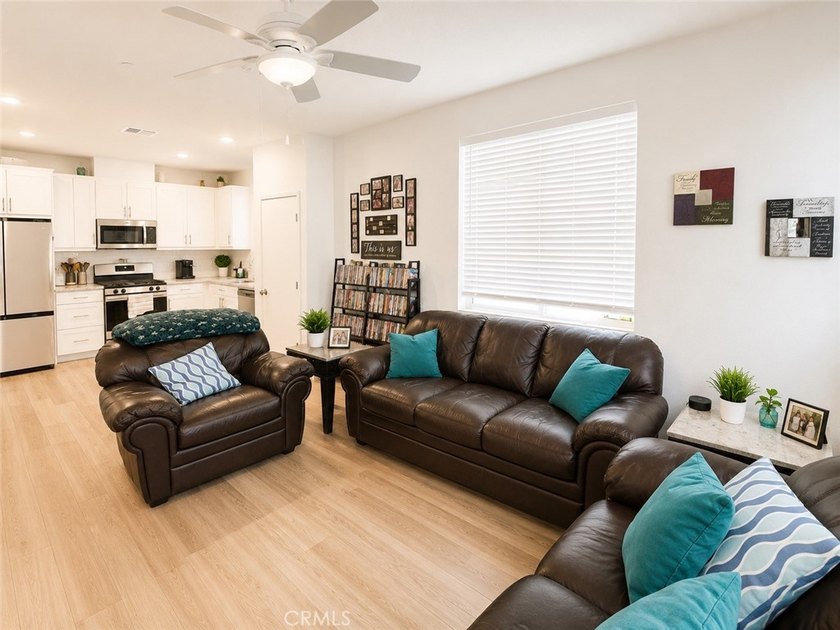 PRICE TO SELL WITH TONS OF UPGRADES! Experience modern living in - photo 5