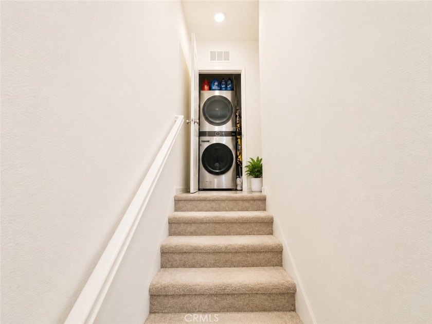 PRICE TO SELL WITH TONS OF UPGRADES! Experience modern living in - photo 6
