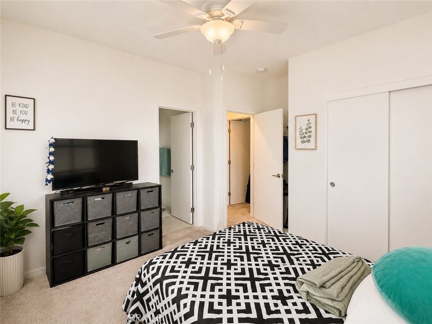 PRICE TO SELL WITH TONS OF UPGRADES! Experience modern living in - photo 7