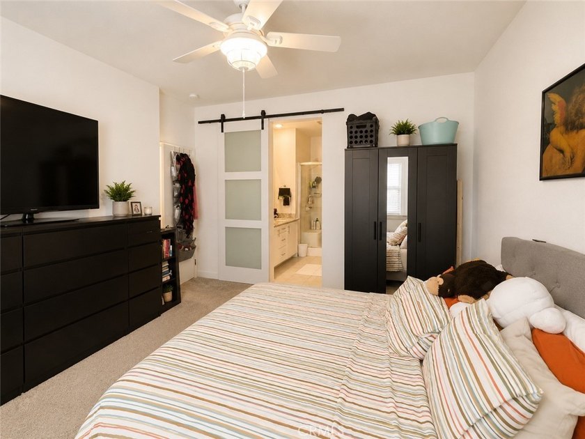 PRICE TO SELL WITH TONS OF UPGRADES! Experience modern living in - photo 9