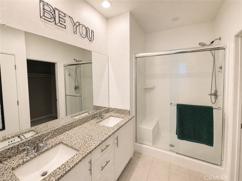 PRICE TO SELL WITH TONS OF UPGRADES! Experience modern living in - photo 10