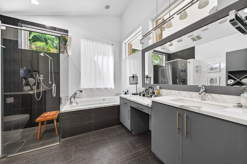 Updated 3 BD 3 BA home with bright, inviting living spaces and - photo 11