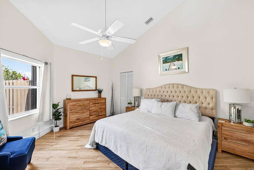 Updated 3 BD 3 BA home with bright, inviting living spaces and - photo 12