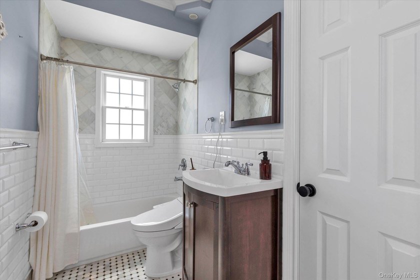 Welcome to this beautiful beachside Colonial located in the - photo 13