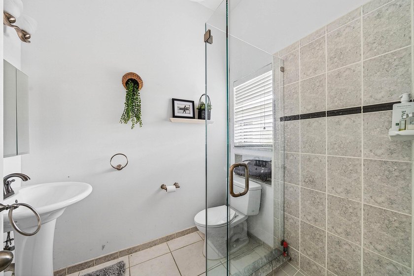 Updated 3 BD 3 BA home with bright, inviting living spaces and - photo 16