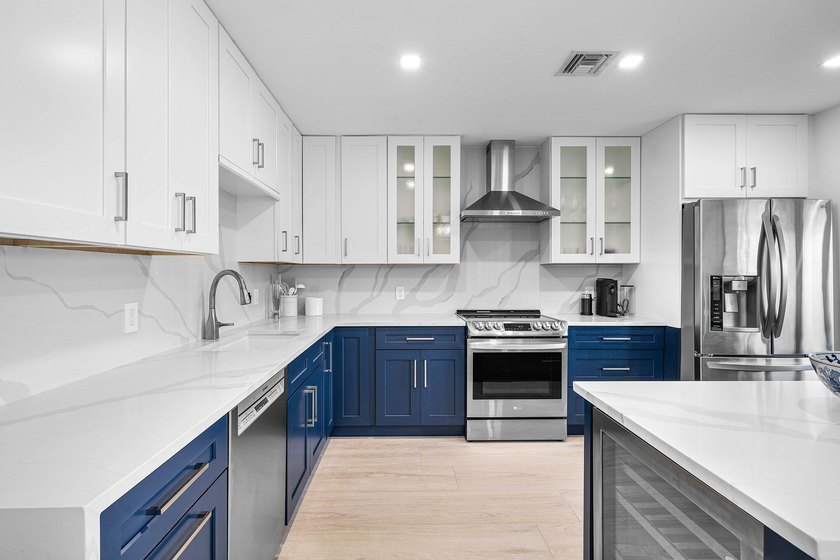 Enjoy tranquil lake views from this beautifully renovated &amp; - photo 2
