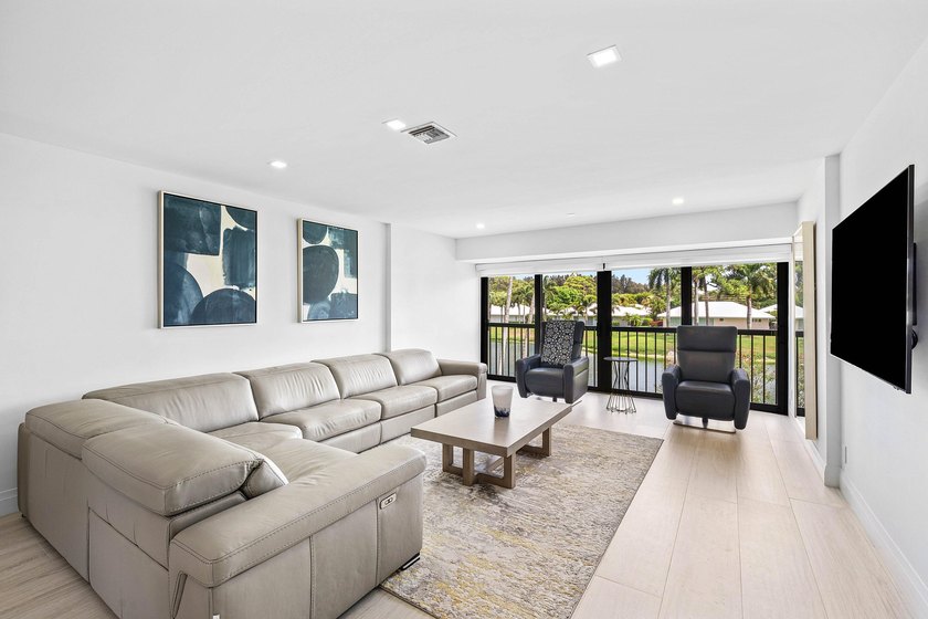 Enjoy tranquil lake views from this beautifully renovated &amp; - photo 4