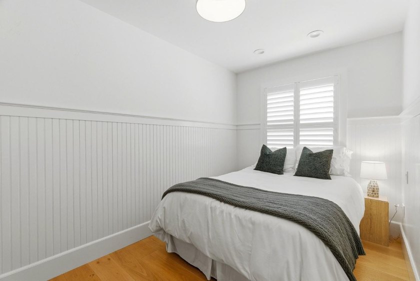 Experience refined coastal living in this fully remodeled beach - photo 15
