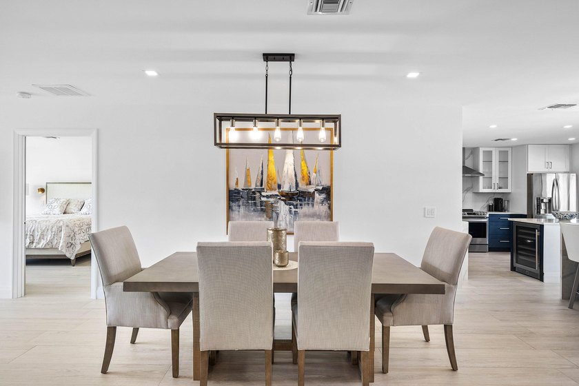 Enjoy tranquil lake views from this beautifully renovated &amp; - photo 5