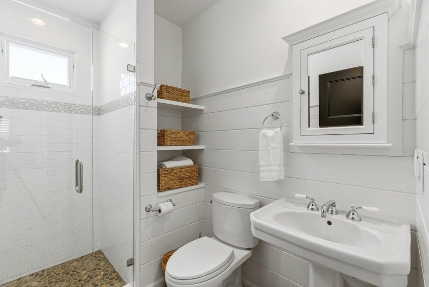 Experience refined coastal living in this fully remodeled beach - photo 16