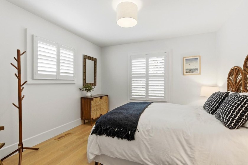 Experience refined coastal living in this fully remodeled beach - photo 17