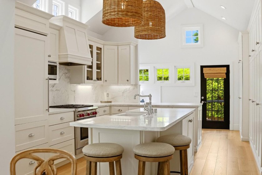 Experience refined coastal living in this fully remodeled beach - photo 20