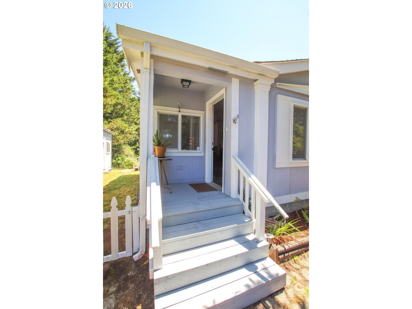 Nestled along the scenic Oregon Coast, this charming 2-bedroom - photo 3