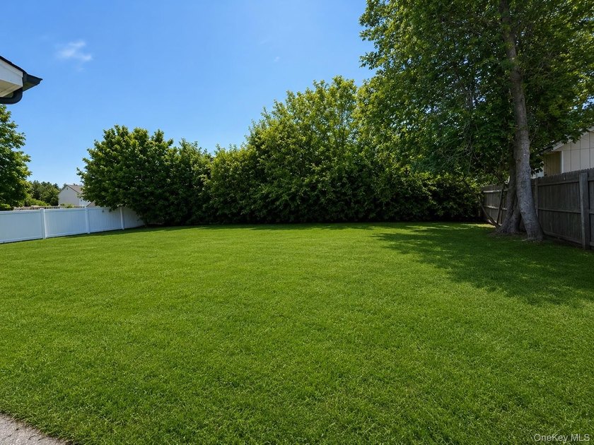 LIVING LUXURY In The Heart Of Bellport! This Ranch Style Home Is - photo 13