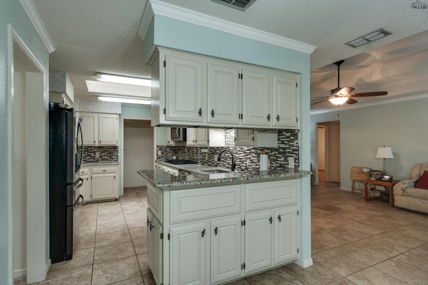 Welcome home to this updated Sikes Estates property featuring a - photo 11