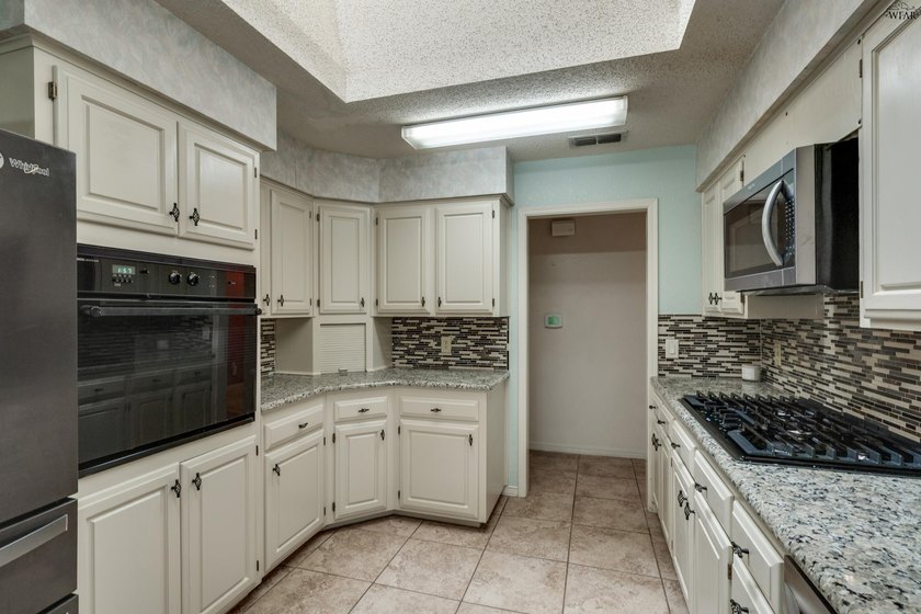Welcome home to this updated Sikes Estates property featuring a - photo 13