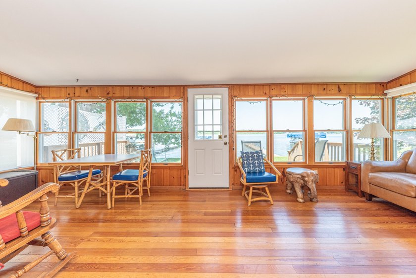Welcome to this 3-bedroom, 2-bathroom waterfront residence in - photo 9